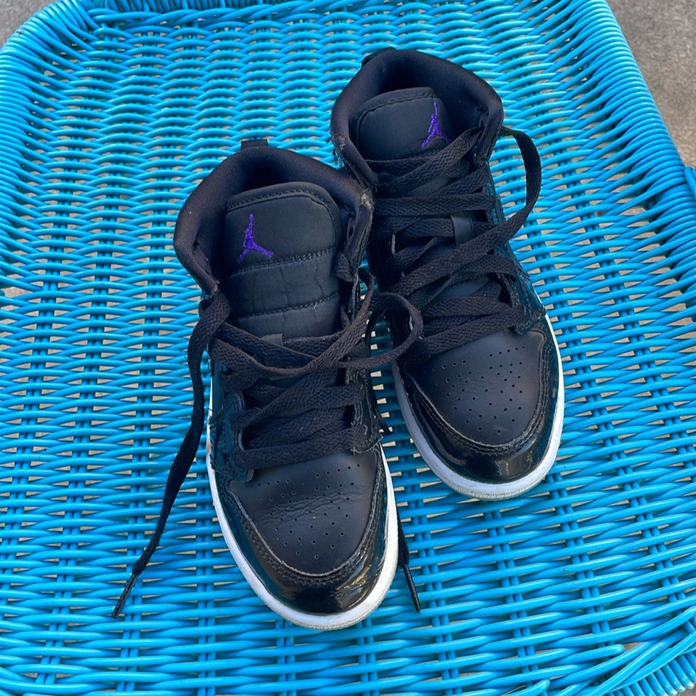 Kids 13C Jordans black with purple Jordan logo. Like new